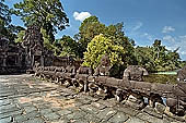 Preah Khan temple - east entrance of the fourth enclosure, the bridge lined by devas and asuras.